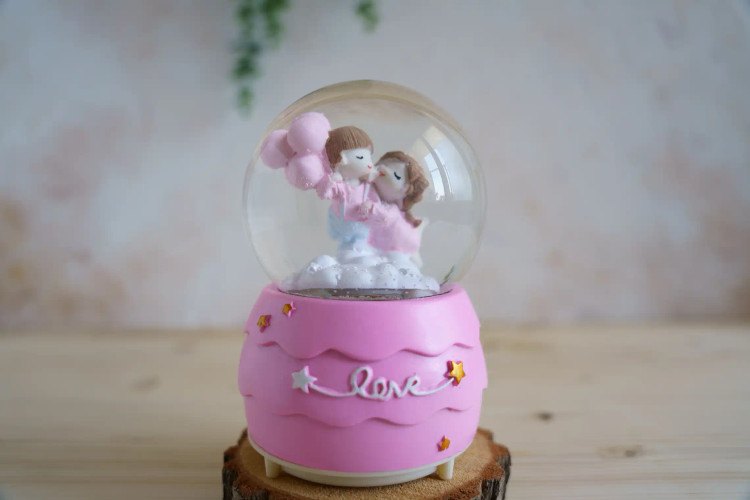 گوی موزیکال پمپی بزرگ دارای ۸موزیک و ۸رقص نور طرح Love صورتی